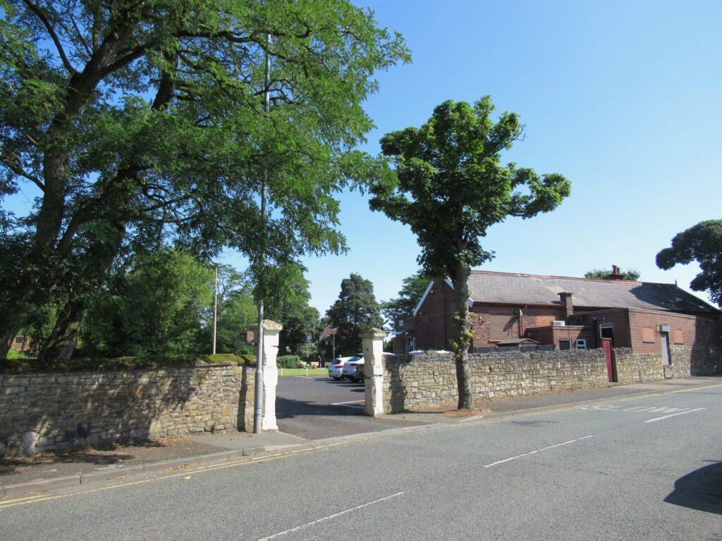 the old walls and gateposts of the bowling club